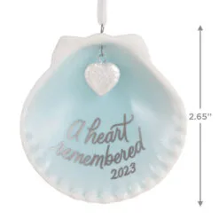 Hallmark A Heart Remembered 2023 Porcelain Ornament 8 Hallmark A Heart Remembered 2023 Porcelain Ornament -Hallmark Store A Heart Remembered Seashell Keepsake Ornament 1799QHX3037 03