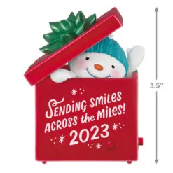Hallmark Smiles Across The Miles 2023 Recordable Sound Ornament 8 Hallmark Smiles Across The Miles 2023 Recordable Sound Ornament -Hallmark Store Snowman in Red Present Keepsake Ornament 2499QGO2619 03